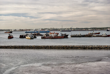 Montevideo, Uruguay - December 22, 2022: Abandoned marine vessels in the harbour of Montevideo, capital of Uruguay