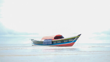 Naklejka premium boat in the sea