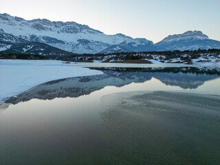 sunset time on frozen lake, wonderful nature and amazing mountains