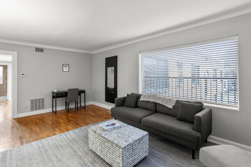 modern interior of a white apartment with open floor layout long term rental loft