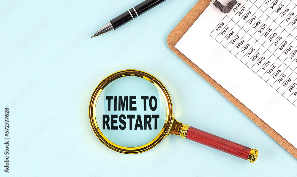 Poster time to restart text on magnifier with clipboard on blue background