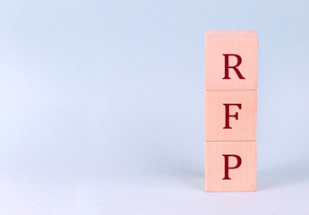 RFP on wooden cubes on a blue background