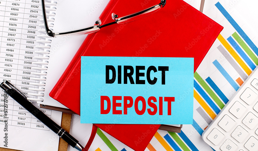 Aufkleber direct deposit text on sticky on red notebook on chart background