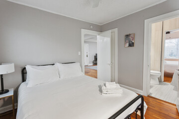 Fototapeta na wymiar modern interior of a white apartment with open floor layout long term rental loft