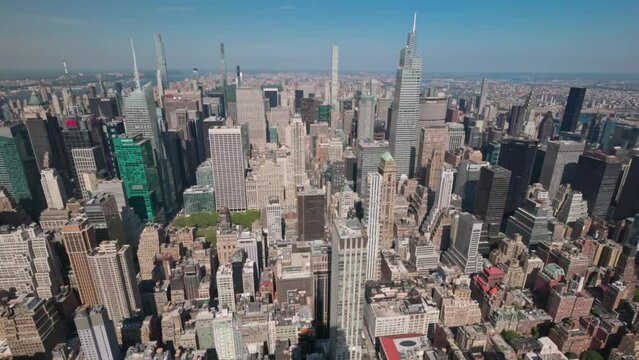 Beautiful panoramic view upp till down from above on roofs of skyscraper buildings. Manhattan, New York, USA.