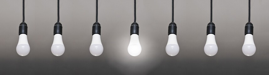 seven LED lamps on wires, only one lamp is lit.