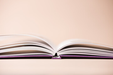 Open book with a purple cover