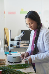 Female native american scientist in the laboratory