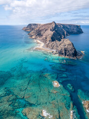 Porto Santo Islet - Fantastic drone top view of crystal clear turquoise water of 