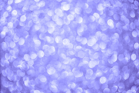 Abstract festive elegant blue background of blurred with bokeh lights and stars texture