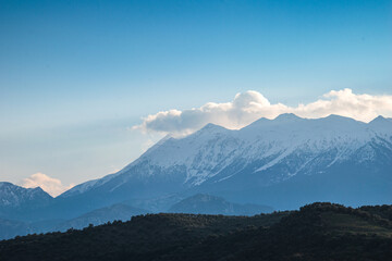 Fototapeta na wymiar View of the impressive snowy mount Taygetus from Lakonia, Greece