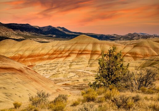Painted Hills at sunset.  It is one of the three units of the John Day Fossil Beds National Monument, located in Wheeler County, Oregon, located 9 miles northwest of Mitchell.