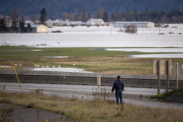 Fraser Valley farmers fields flooded from torrential rains, climate change effect, natural...