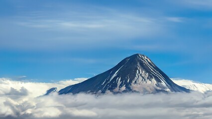 mountain top above the clouds