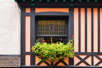 window at a beautiful old half-timbered house in Dieppe, France