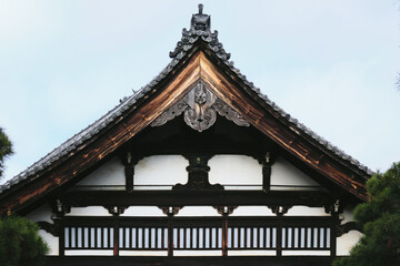 Detail of the top of a wooden temple in Kyoto, Japan