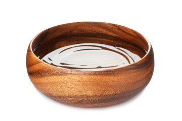 Wooden bowl full of water isolated on white