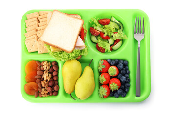 Green tray with tasty food on white background, top view. School lunch