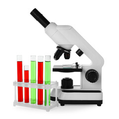 Test tubes with colorful liquids and microscope isolated on white