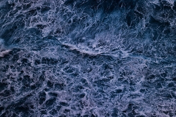 sea waves foam drone view abstract background ocean top