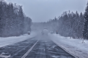 winter highway snowfall background fog poor visibility