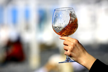 a glass of port wine in hand, portugal drink alcohol