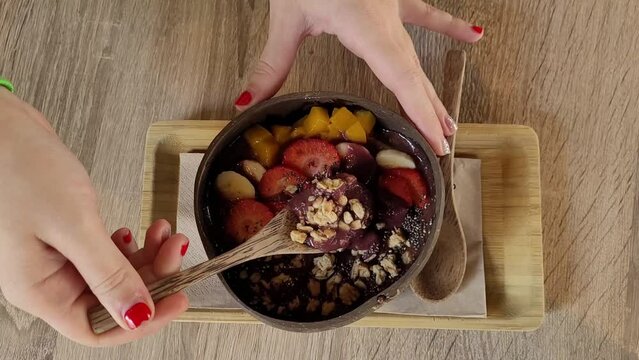 acai bowl with fruit and nuts