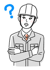 腕組みする若い作業員と疑問符
