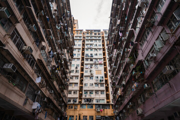An estate housing is crowded and out of maintenance.  