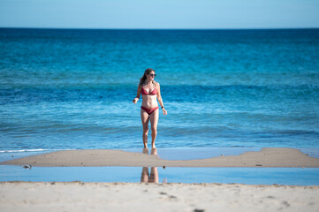 Pregnant woman on the beach of Alicante in Spain.