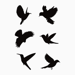 Obraz na płótnie Canvas Vector silhouette flying birds on white background. Tattoo