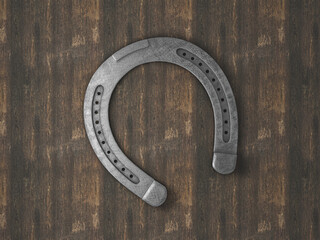 Horseshoe on wooden background
