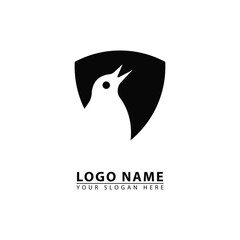 vector bird head in shield logo icon.