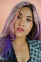 Asian woman with colorful hair expression