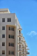 Low angle view of modern condo building in Armacao de Pera