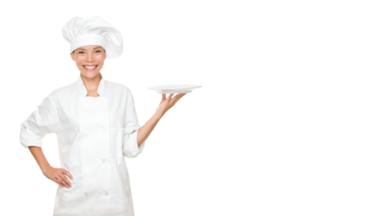Chef showing empty plate. Happy smiling portrait of female in chef uniform and chef hat isolated cutout PNG on transparent background. Asian Caucasian woman model.
