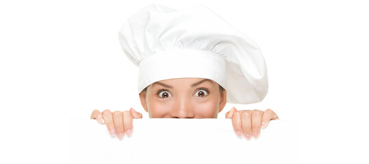 Chef Sign. Woman cook / baker looking over paper sign billboard. Surprised and funny expression on...
