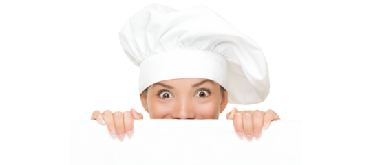 Chef Sign. Woman cook / baker looking over paper sign billboard. Surprised and funny expression on young Asian / Caucasian woman isolated cutout PNG on transparent background.