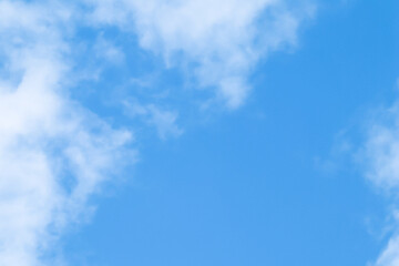 Background of blue sky with white clouds