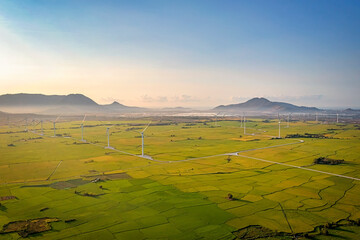 Panoramic view of wind farm or wind park, with high wind turbines for generation electricity with...