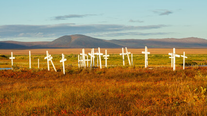 White crosses in a derelict cemetery on the tundra near Nome, Alaska