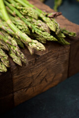 Green asparagus in a wood box