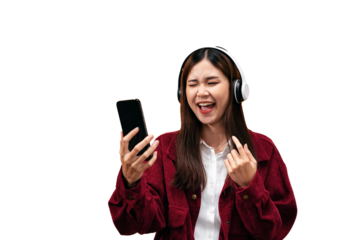Young asian woman wearing headphone and red jacket while listening music and reading lyrics on smartphone to singing the song isolated