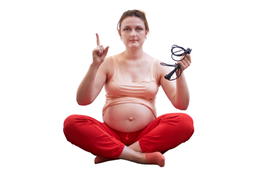 Pregnant woman with jumping ropes shows that you cannot jump during pregnancy, isolated on a white background - Powered by Adobe
