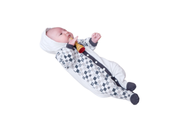 Newborn baby boy in a chess suit near a chessboard with placed pieces, isolated on a white background. Kid aged two months