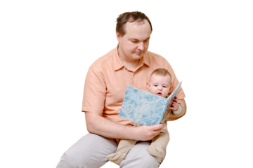 Man father and boy son are reading a book on sofa in home living room, isolated on a white background. Kid aged six months