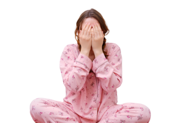 Portrait of an adult woman in red pajamas, isolated on a white background