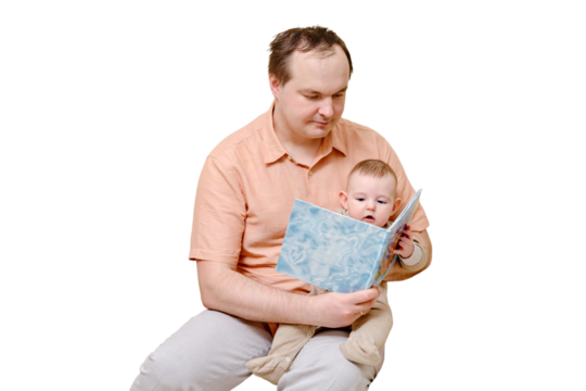 Man father and boy son are reading a book on sofa in home living room, isolated on a white background. Kid aged six months