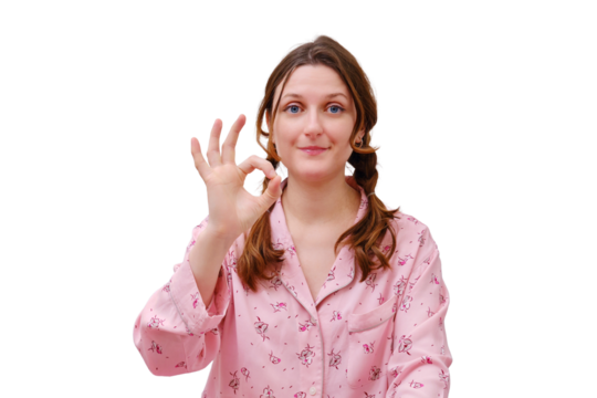 Portrait of an adult woman in red pajamas, isolated on a white background