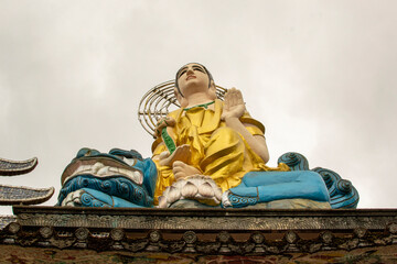 Buddha sitting on dragon at Linh Phuoc Pagoda in Da Lat, Vietnam